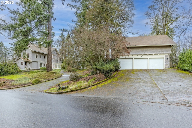 exterior space with a garage