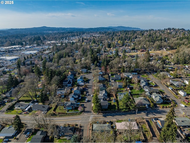 birds eye view of property with a residential view