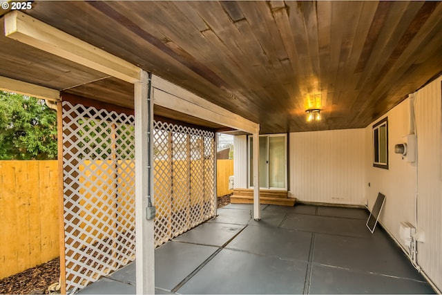 view of patio featuring fence