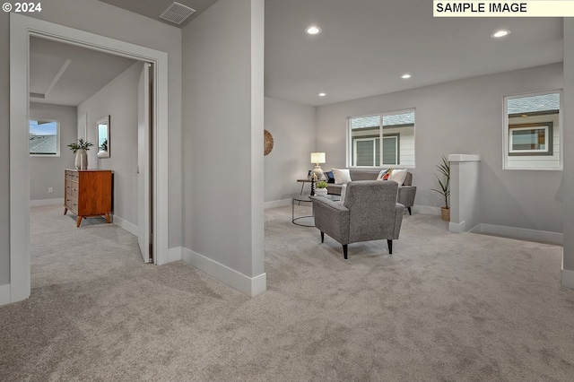 16755 SE Shimmering Leaf St, Happy Valley, OR 97086 - carpeted living room with baseboards, recessed lighting, and visible vents