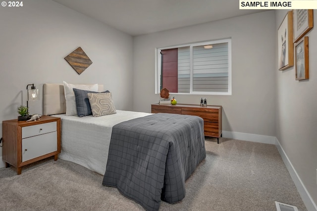 16755 SE Shimmering Leaf St, Happy Valley, OR 97086 - bedroom with baseboards, light carpet, and visible vents