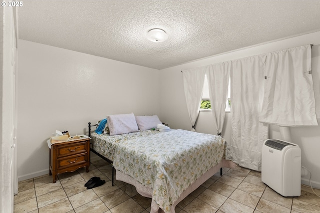 1720 17th St, Springfield, OR 97477 - bedroom featuring a textured ceiling and light tile patterned floors