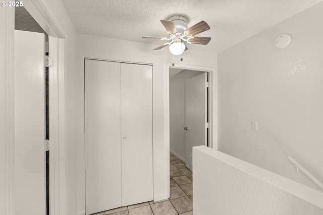 1720 17th St, Springfield, OR 97477 - hallway with light tile patterned floors and a textured ceiling
