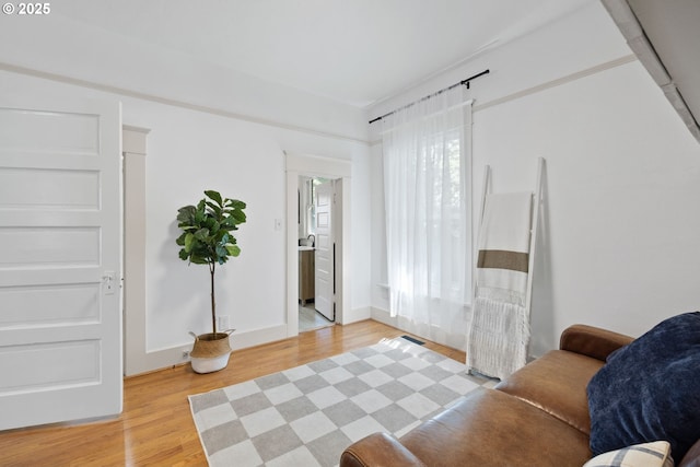 sitting room with light wood finished floors