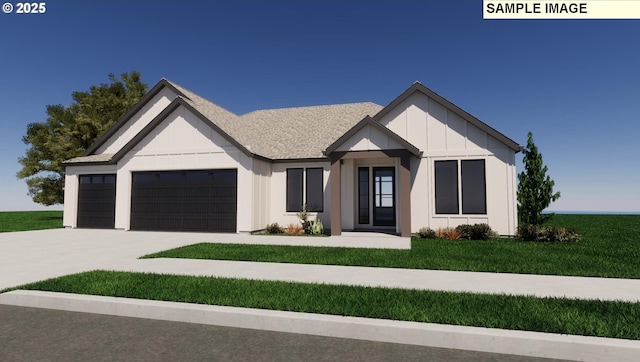 modern inspired farmhouse with a garage and a front yard