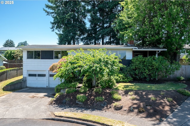 13530 NE Milton St, Portland, OR 97230 - view of front of property featuring concrete driveway and a garage