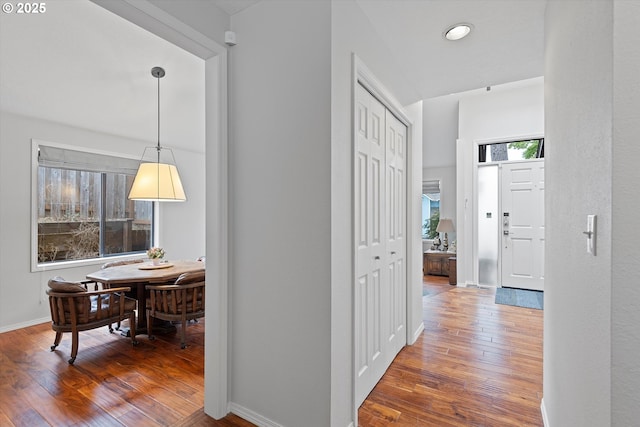 hallway featuring dark hardwood / wood-style floors