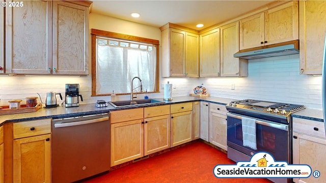 1560 S Edgewood St, Seaside, OR 97138 - kitchen with appliances with stainless steel finishes, under cabinet range hood, decorative backsplash, recessed lighting, and light brown cabinetry