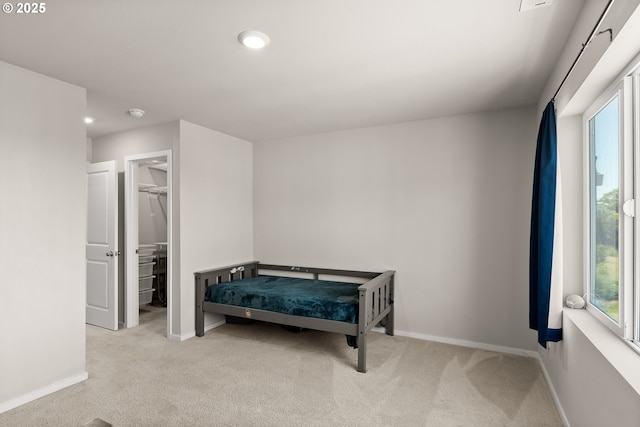 15470 NW Blueblossom St, Portland, OR 97229 - bedroom featuring multiple windows, carpet flooring, a walk in closet, recessed lighting, and a closet