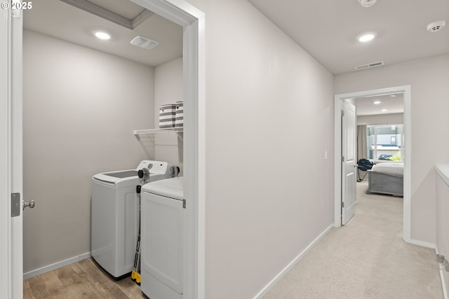 15470 NW Blueblossom St, Portland, OR 97229 - washroom with washer and clothes dryer and recessed lighting