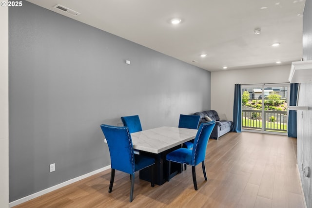 15470 NW Blueblossom St, Portland, OR 97229 - dining area featuring wood finished floors and recessed lighting