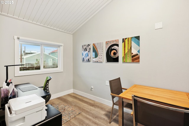 office featuring light hardwood / wood-style floors, vaulted ceiling, and wooden ceiling