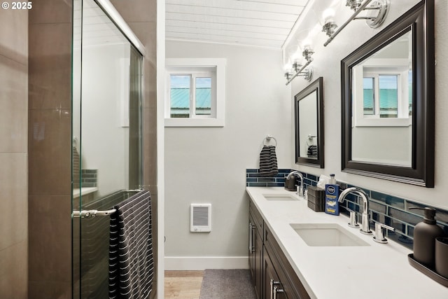 bathroom featuring vanity, vaulted ceiling, a shower with shower door, and wood ceiling