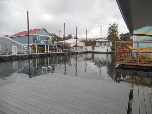 dock area featuring a water view