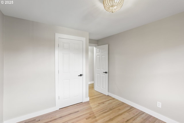 unfurnished bedroom with light hardwood / wood-style flooring