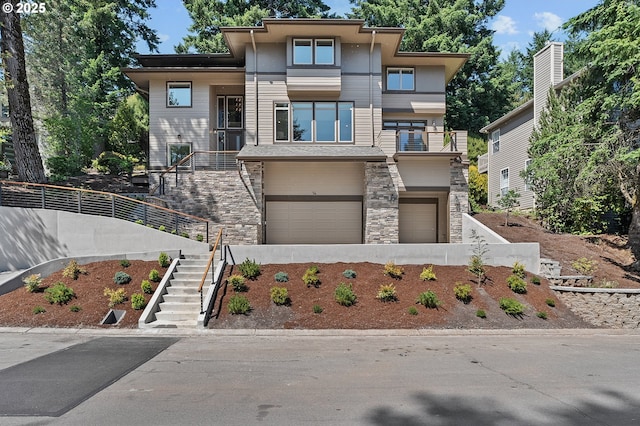14 Juarez St, Lake Oswego, OR 97035 - view of front of home featuring stairway, stone siding, an attached garage, and stucco siding