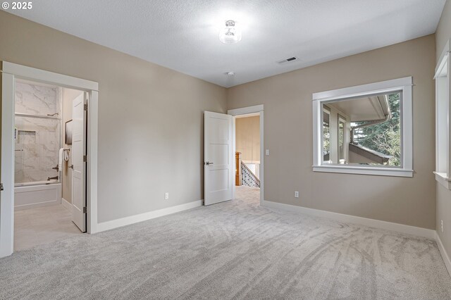 14 Juarez St, Lake Oswego, OR 97035 - unfurnished bedroom with carpet, baseboards, and connected bathroom