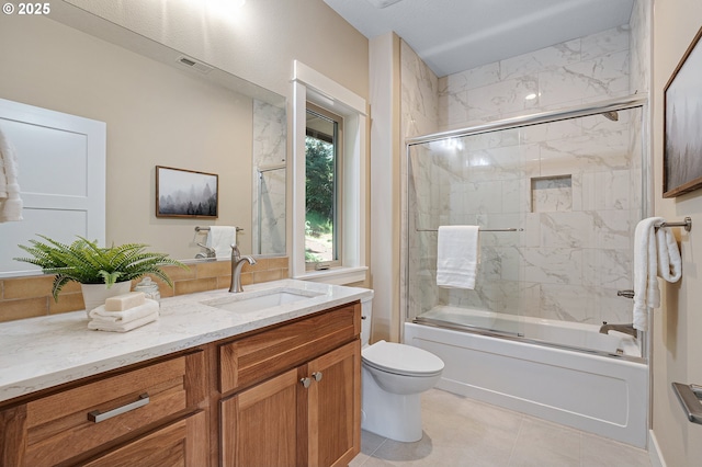 14 Juarez St, Lake Oswego, OR 97035 - bathroom with vanity, toilet, bath / shower combo with glass door, and tile patterned floors