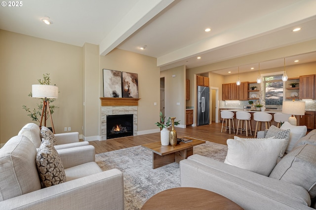 14 Juarez St, Lake Oswego, OR 97035 - living room with light wood-type flooring, beam ceiling, a fireplace, recessed lighting, and baseboards