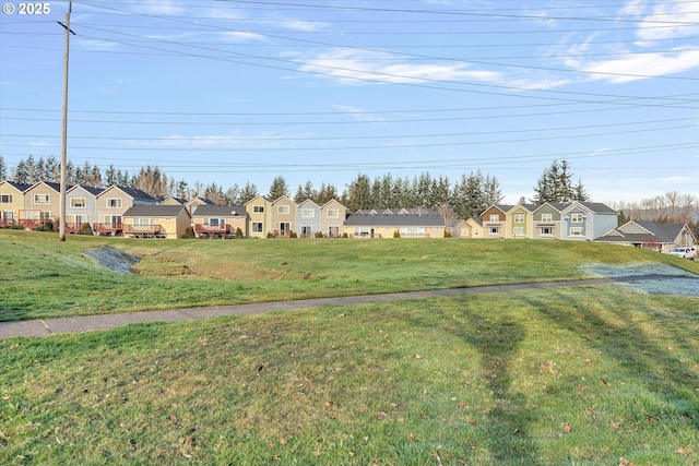 view of yard featuring a residential view
