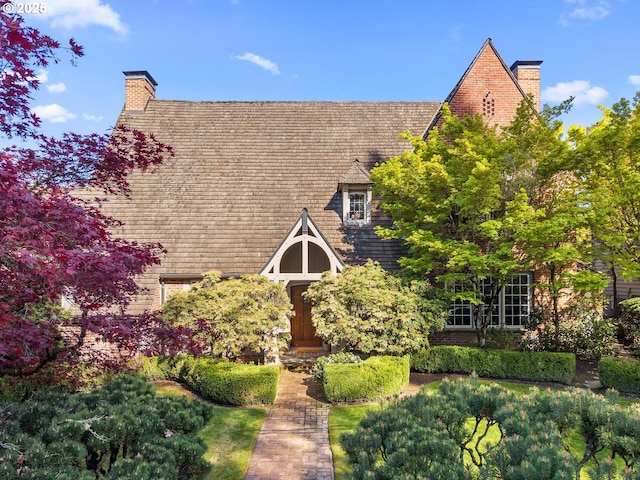 view of front of home with a chimney