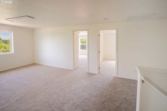 24823 Hawks View Dr, Veneta, OR 97487 - empty room with light colored carpet and a textured ceiling