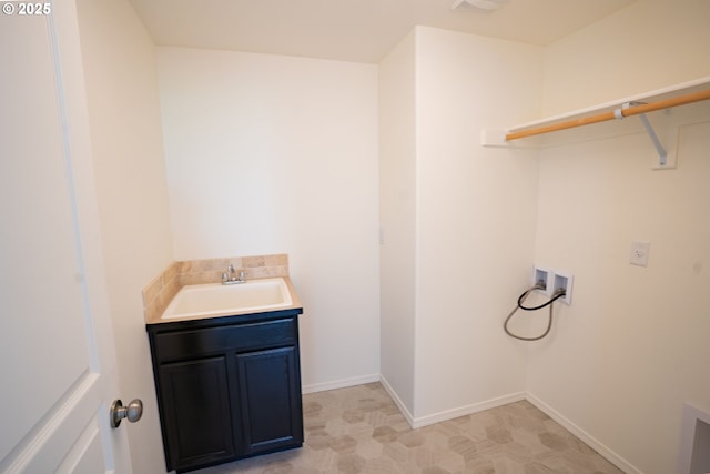 24823 Hawks View Dr, Veneta, OR 97487 - washroom featuring washer hookup, light floors, and bar with sink