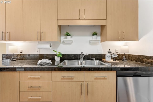 kitchen featuring stainless steel dishwasher and light brown cabinets