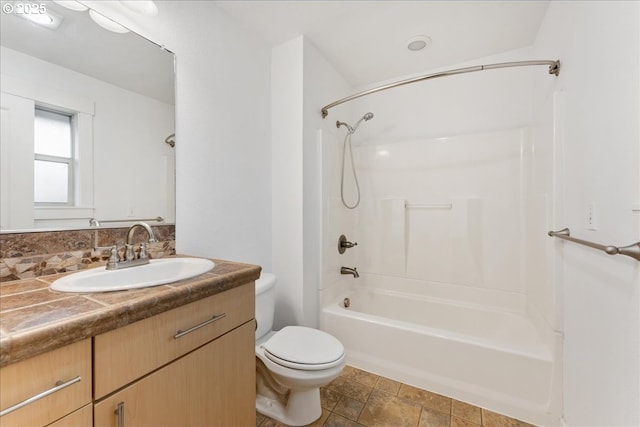 full bathroom with backsplash, toilet, vanity, and shower / tub combination