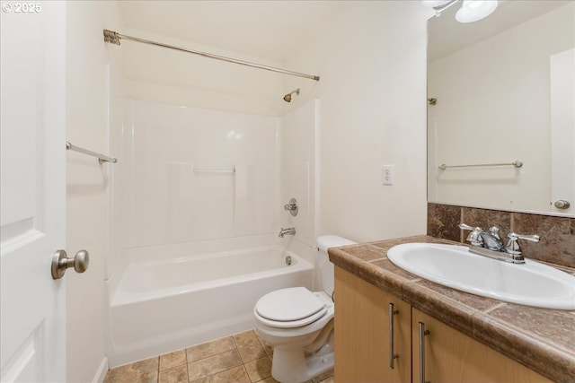 full bath featuring tile patterned floors, toilet, vanity, and shower / tub combination