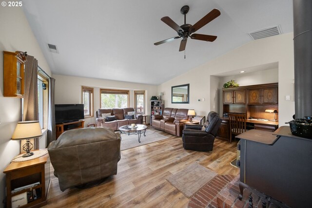 33817 Gage Rd, Mitchell, OR 97750 - living room with vaulted ceiling, a ceiling fan, and light wood-style floors