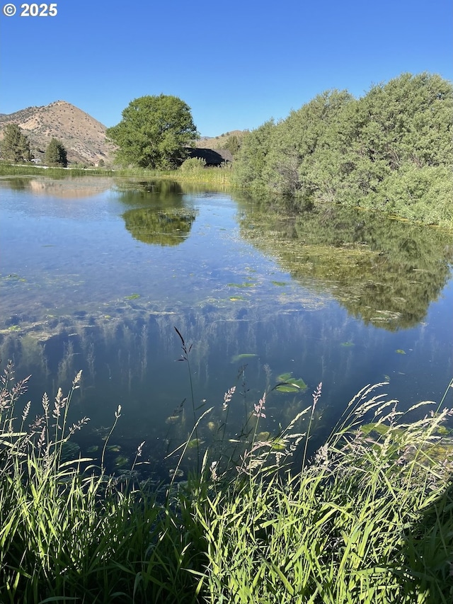 33817 Gage Rd, Mitchell, OR 97750 - water view featuring a mountain backdrop