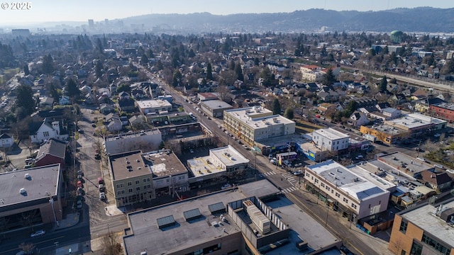 birds eye view of property featuring a mountain view