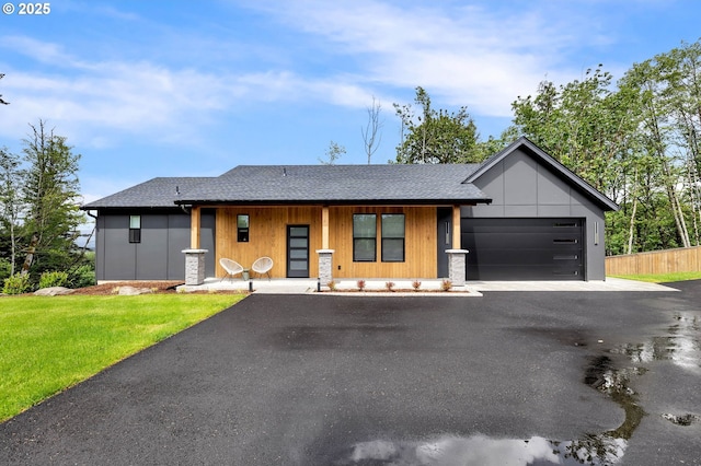 16000 NE Grantham Rd, Amboy, WA 98601 - view of front facade featuring driveway, roof with shingles, and an attached garage