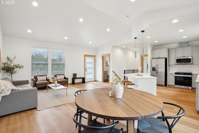 16000 NE Grantham Rd, Amboy, WA 98601 - dining area with lofted ceiling, light wood finished floors, recessed lighting, and baseboards