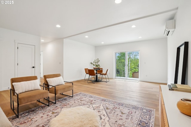 16000 NE Grantham Rd, Amboy, WA 98601 - sitting room with an AC wall unit, light wood-style flooring, recessed lighting, and baseboards