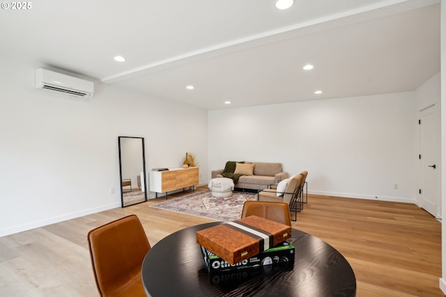 16000 NE Grantham Rd, Amboy, WA 98601 - living room with an AC wall unit, light wood-style flooring, recessed lighting, and baseboards