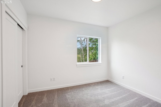 16000 NE Grantham Rd, Amboy, WA 98601 - unfurnished bedroom with a closet, baseboards, and carpet flooring