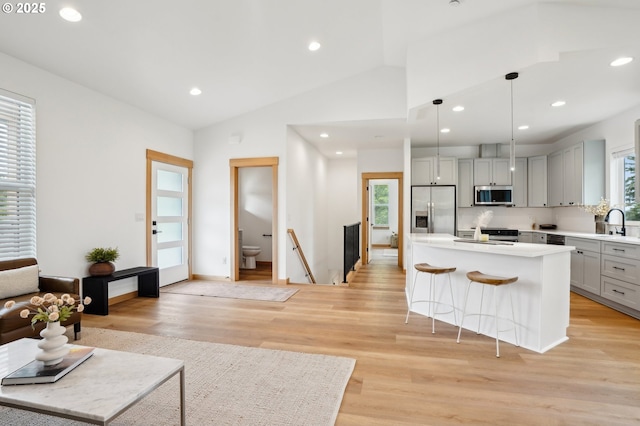 16000 NE Grantham Rd, Amboy, WA 98601 - living room featuring light wood finished floors, recessed lighting, and vaulted ceiling