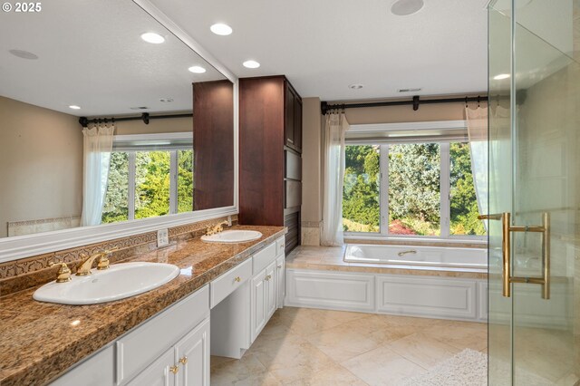 14405 NW Valley View Ln, Portland, OR 97231 - bathroom with recessed lighting, a bath, double vanity, and an enclosed shower