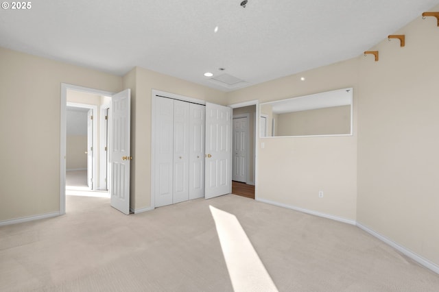 14405 NW Valley View Ln, Portland, OR 97231 - unfurnished bedroom with light carpet, baseboards, a closet, and recessed lighting