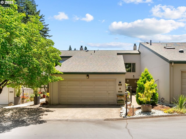 598 Salem Heights Ave S, Salem, OR 97302 - view of front facade with an attached garage, driveway, a shingled roof, and stucco siding