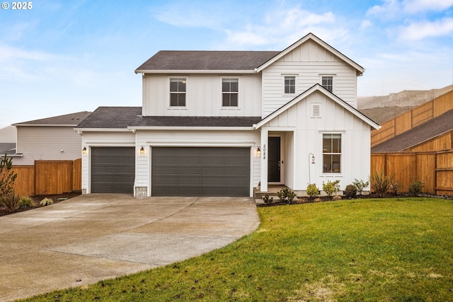 view of front facade featuring a front lawn and a garage