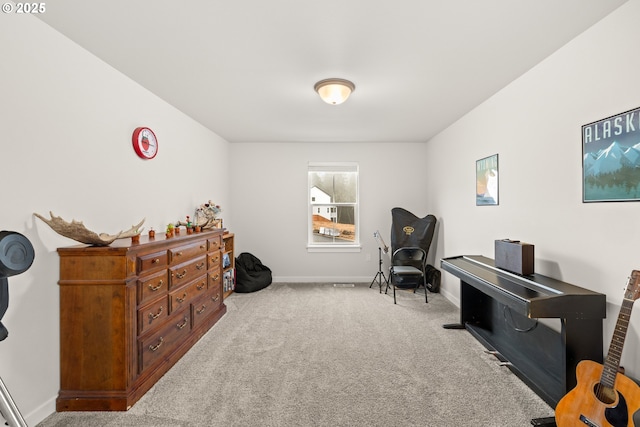 living area featuring light carpet