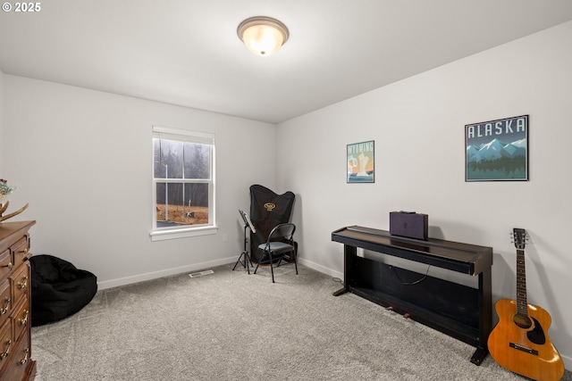 living area with light colored carpet