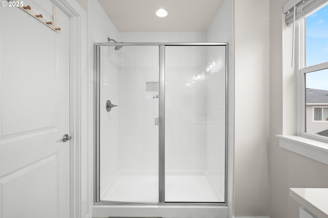 bathroom featuring walk in shower