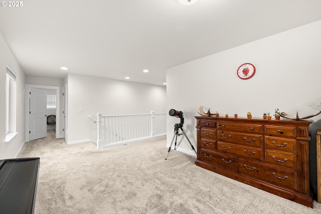 interior space featuring light colored carpet