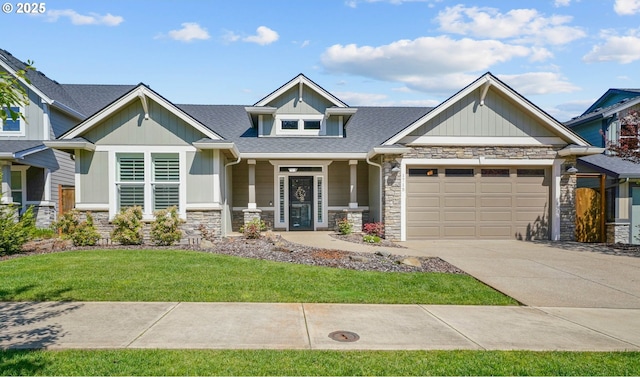 1715 York Butte Ave, Salem, OR 97306 - craftsman inspired home with stone siding, an attached garage, a front lawn, a porch, and driveway