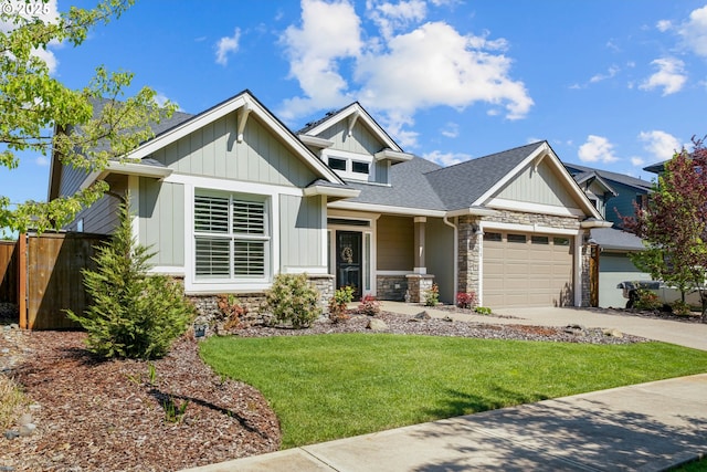 1715 York Butte Ave, Salem, OR 97306 - craftsman house with fence, concrete driveway, a front lawn, and stone siding
