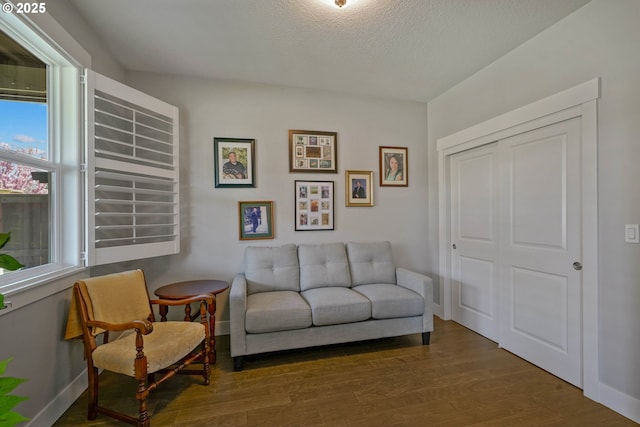 1715 York Butte Ave, Salem, OR 97306 - living area with wood finished floors, baseboards, and a textured ceiling